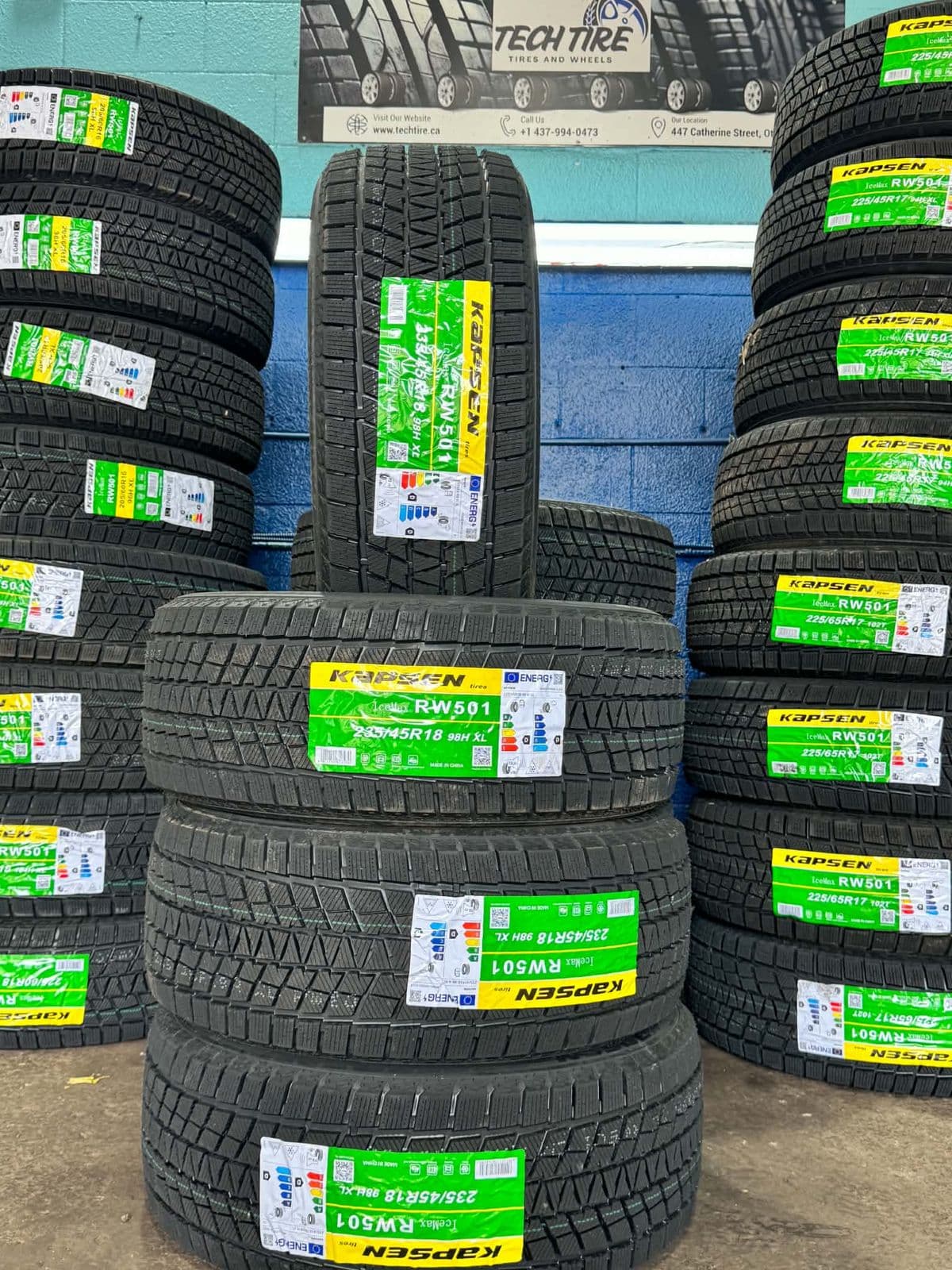 Kapsen IceMax RW501 winter tires in 235/45R18 stacked under the Tech Tire sign at 447 Catherine St, Ottawa